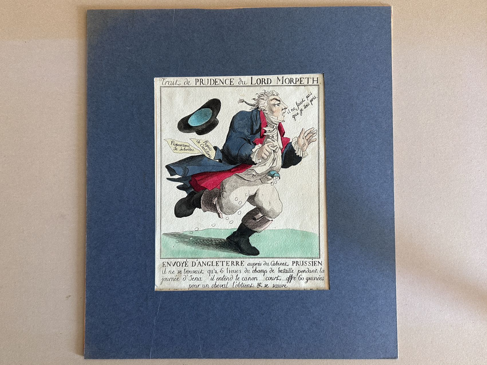 Estampe dans un passe-partout bleu en carton